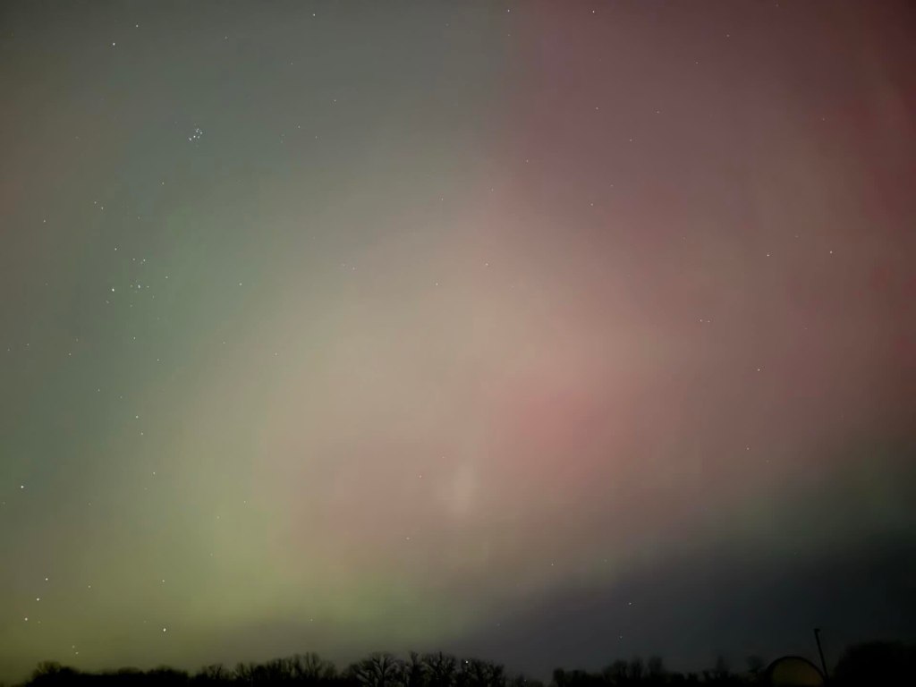 pink green and creamy/cloudy streaks with stars