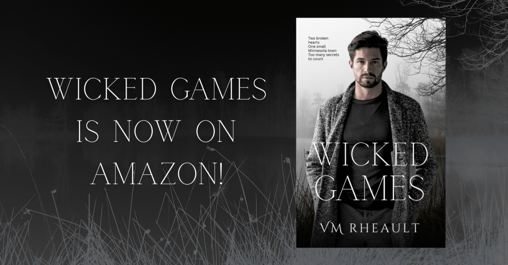 Promotional graphic for Wicked Games by VM Rheault featuring the book cover against a dark, moody wooded background with text reading “Wicked Games is now on Amazon!”